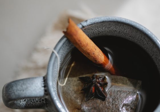 cup of tea with a cinnamon stick