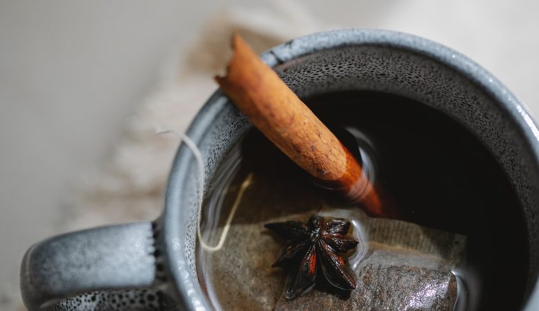 cup of tea with a cinnamon stick