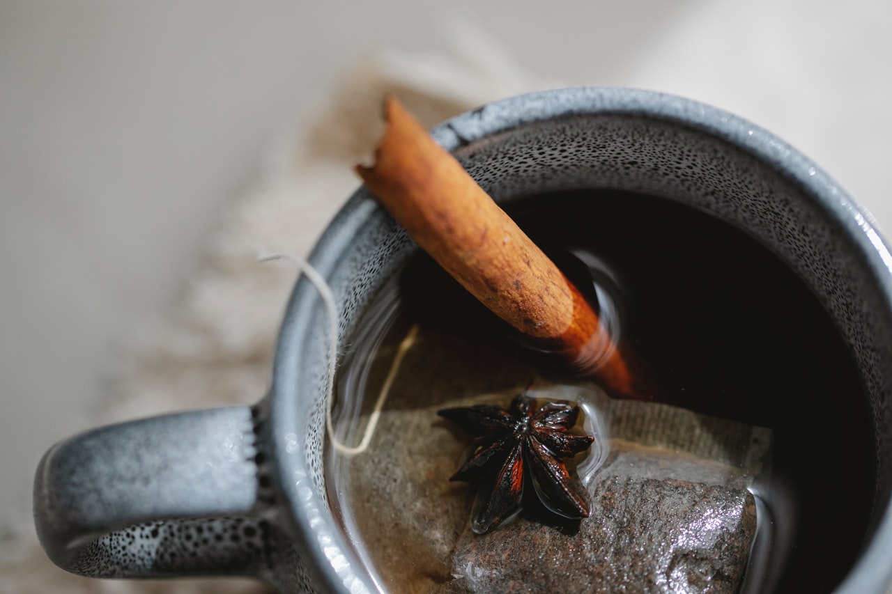 cup of tea with a cinnamon stick